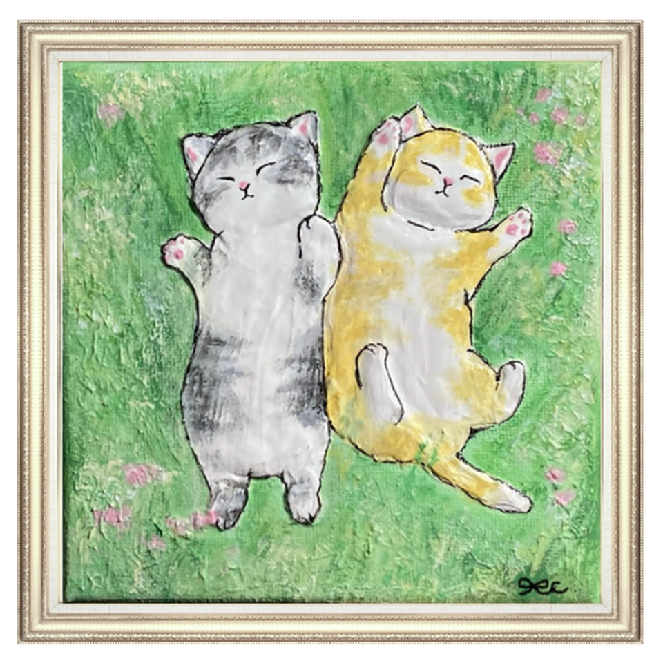 Painted white and orange cartoon cats standing together among small pink flowers.